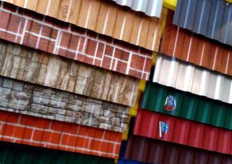 Як правильно обшити ворота профнастилом і чи варто це того?